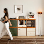 Mid century modular storage units stacked two high in a living room with a coffee machine and lamp
